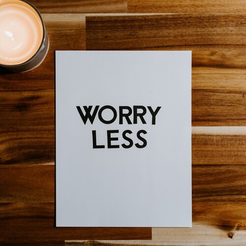 sign that says Worry Less
