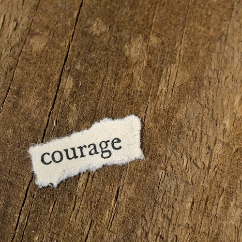 scrap of paper that says Courage